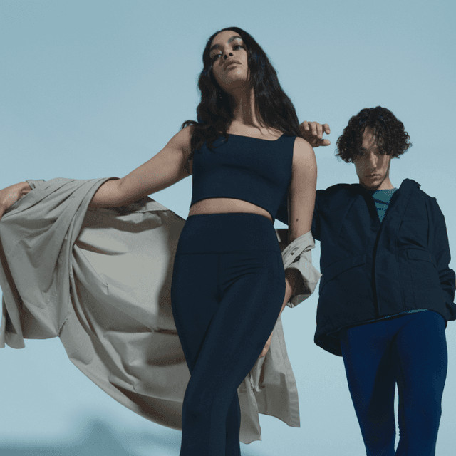 woman and man showing off clothes